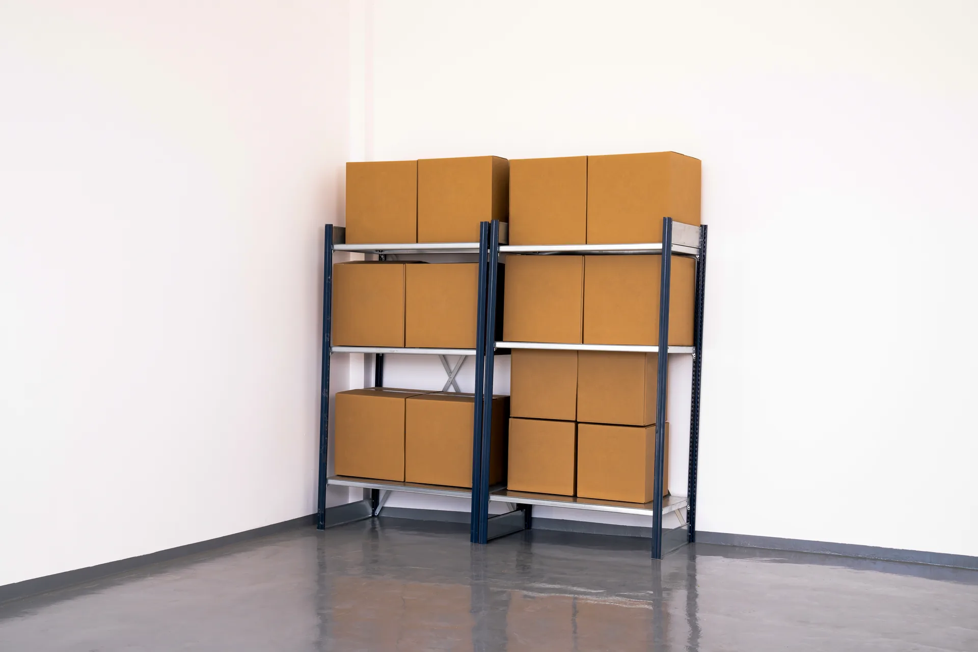 Inside a WheeKeep storage unit with shelving and archive boxes